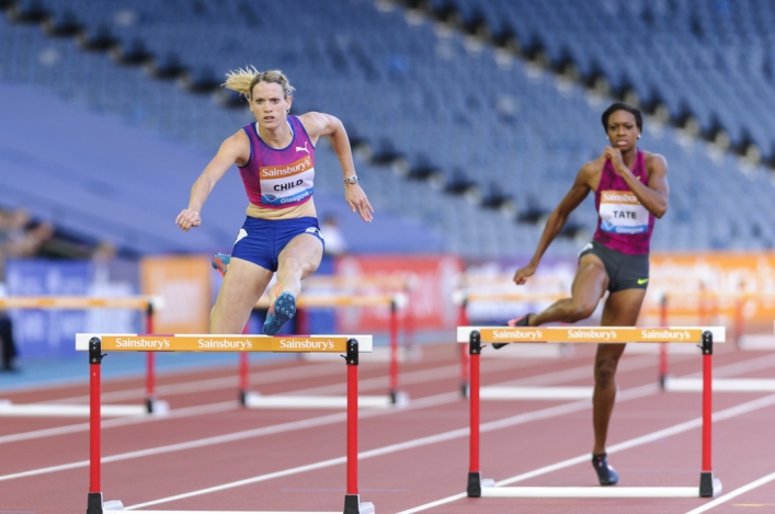 Eilidh Child clears a hurdle at the Glasgow Diamond League