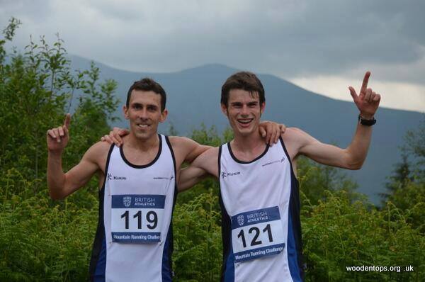 Andrew Douglas and Robbie Simpson celebrate hill running success in their Scotland vests