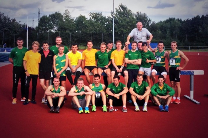 Glasgow athletes in yellow and green celebrate promotion